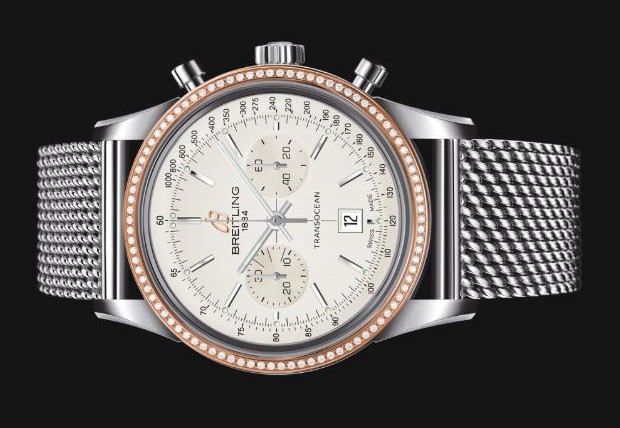 The fake Breitling Transocean Chronograph 38 U4131053 watches decorated with diamonds.