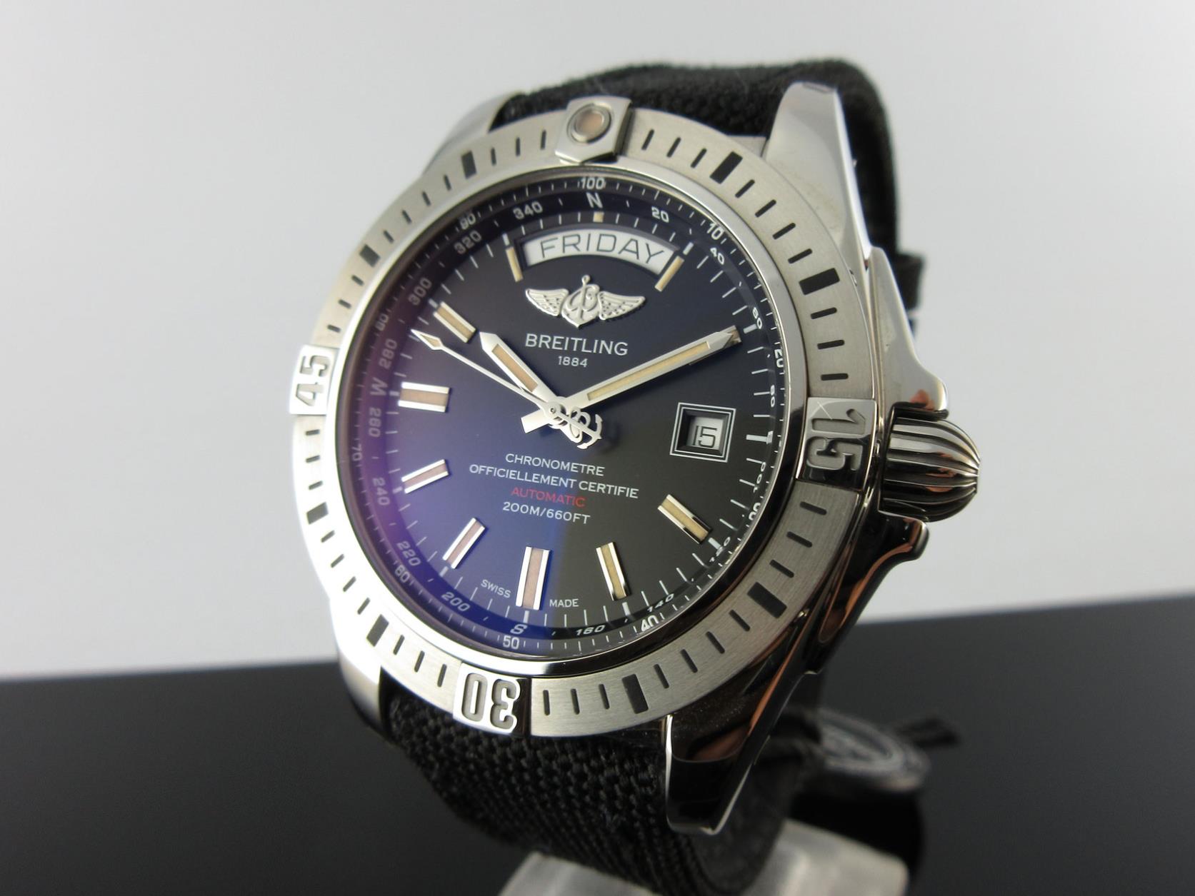 The black dial fake watch has both day and date windows.